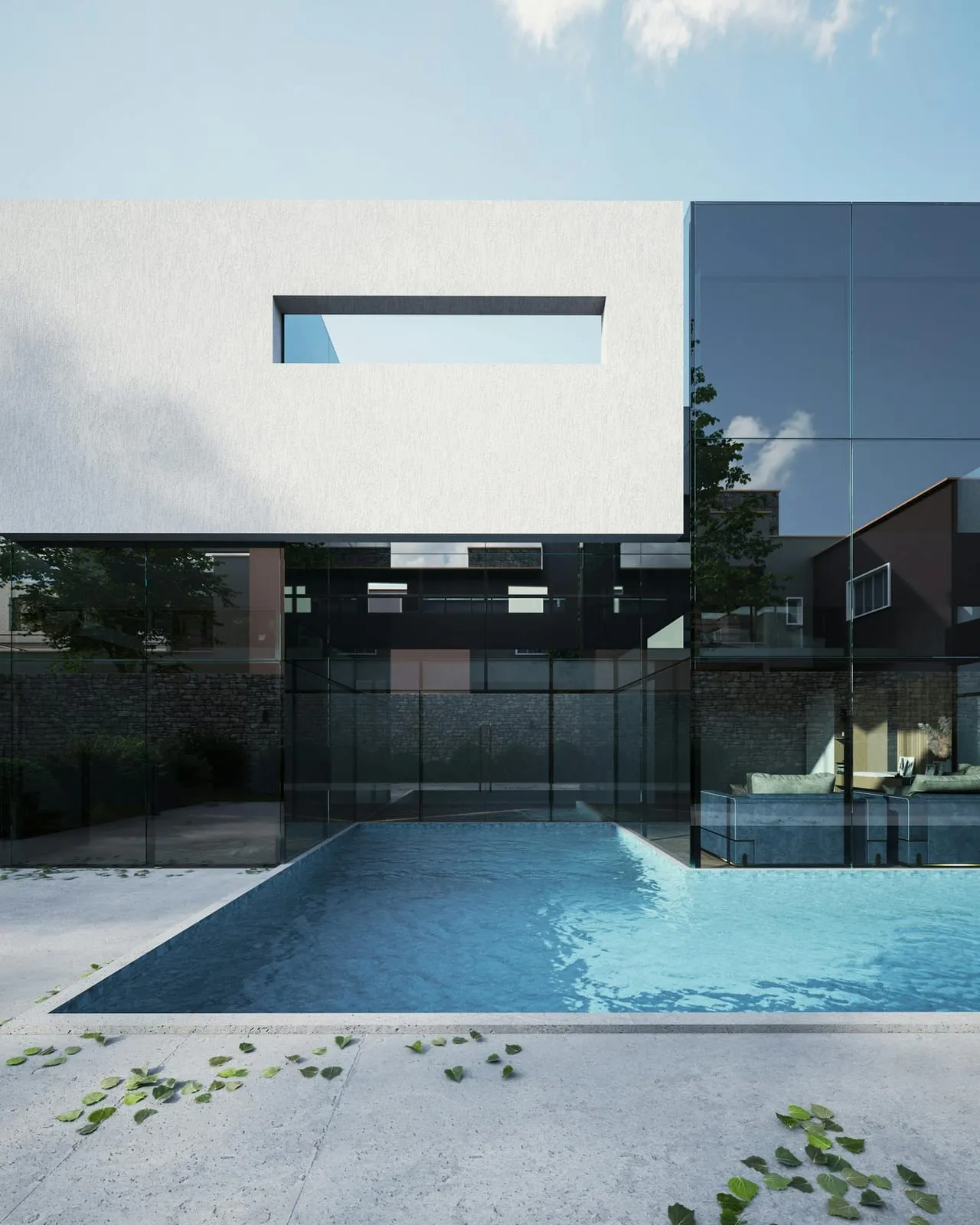 Concrete and glass house overlooking a swimming pool